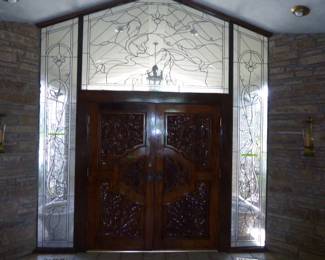 Leaded Glass Surround around the Door
$2,150.00 / for all. The Leaded Glass above the door is 80″W X 54″H. 2 Sides by the Door are 21″W X  120″R.S.-128″L.S. and other panel is 21″W x 120″L.S.-128″R.S. The 2 large Panel are 42″ X 101″. The price also includes the protective glass outside.