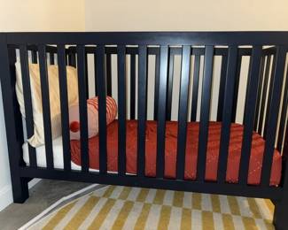Navy blue crib and mattress (used less than a year)