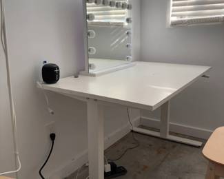 hair and makeup table with light