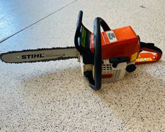 Stihl 025 chainsaw with case and face-shield helmet