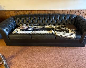 Leather tufted sofa