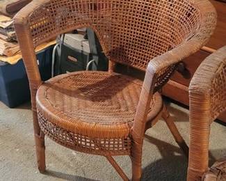 Pair of vintage barrel rattan chairs