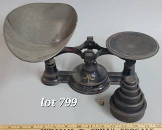 Antique cast iron scale with set of cast iron weights