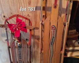Vintage snow sleds, two of several available in auction