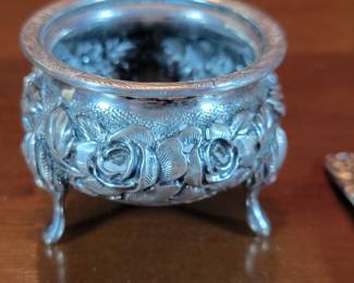 Pair of sterling floral embossed salt cellars