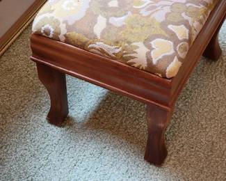 Antique upholstered footstool