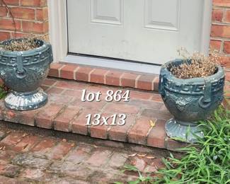 Pair of green cast iron planters