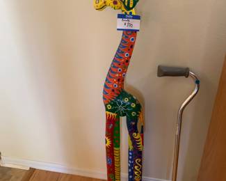Handmade, hand painted giraffe. Discounted due to some damage