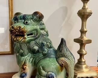 One of a pair of Foo Dogs and Candlesticks
