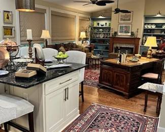 View of the kitchen island and den