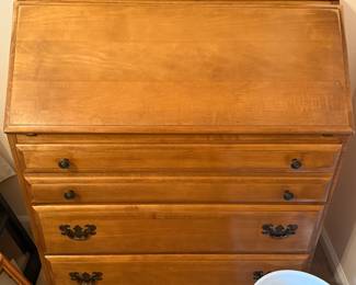This is from our first walk through of the home. Here is a beautiful, solid wood secretary, dresser in the early American style.