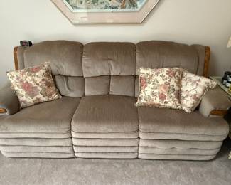 This is from our first walk through of the home. This is an excellent large sofa in pristine condition. Each of the ends left and right are recliners.