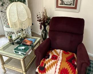 This is from our first walk through of the home. Here is another very comfortable recliner. To the left one of many beautiful lamps throughout the home.