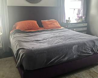 Queen Bed and Circular Mirror