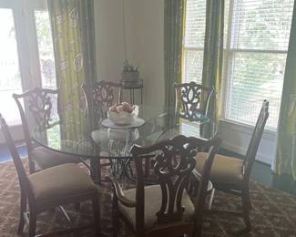 Round Glass Top Dining Table and Six Chippendale Chairs