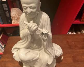 Asian Man Playing Flute