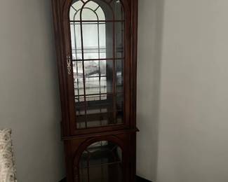 Mirror backed curio cabinet