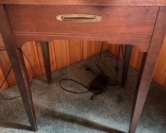 Sewing Machine in Cabinet w/DVD/VHS on top (Upstairs Bedroom in House)