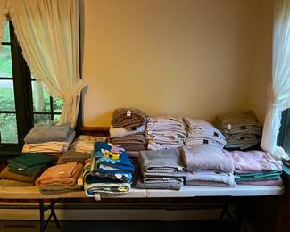 Misc. Towels on Table LOCATED @ end of Bedroom Hall on Right Past 2nd Bathroom