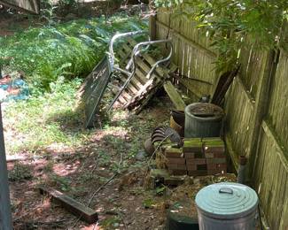 Pool Ladders, Pallets, Bricks, Misc. Wood, Garbage Cans Location Behind Garage