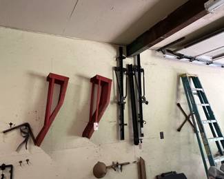 Car Ramps,a Square, Step Ladder, Tire Iron Location Garage