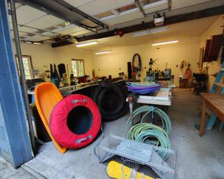 Garage View from Entrance Safe Traps, Hoses, Snow Tubes etc....