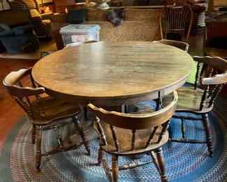 48" Round Table w/4 Chairs & 5 Leafs @ 14" each (Location in Kitchen)