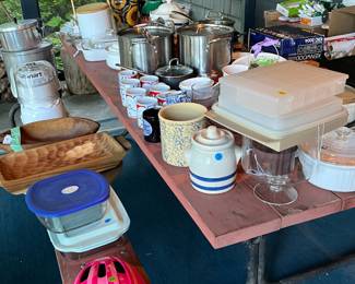 Assorted Pots & Pans, Cookware, Servingware, Unique Woodware Pieces, Dishes & Tupperware & More Some on the Large Picnic Table Location Enclosed Patio & Some in the Kitchen