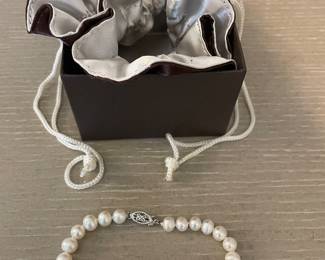 7” Faux Pearl Bracelet from Village Jewelry $20. Ask to see.