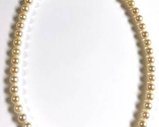 Genuine Pearl Necklace With 14K Gold Clasp
Lot #: 10