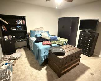 Wood Bookshelf / Desk Combo with drawers, Bed frame with matress and box spring, blankets, Antique storage chest, Wood Armoire / Entertainment Center, dresser, tv, sheets and blankets
