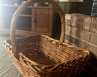 Large wicker basket with handle.