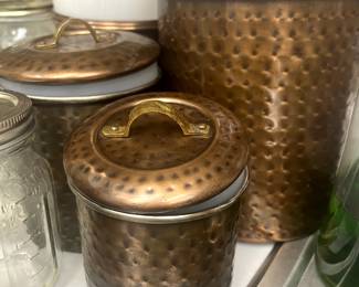 Vintage hammered copper canisters
