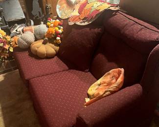 Upholstered loveseat, holiday decor, miscellaneous.