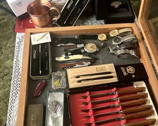Pocket knifes, watches, plated silver, silver, mink, copper mug , etc. 