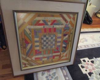 Antique cigar band small framed quilt