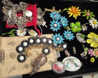 Rhinestones, 1960's flower power pins, sterling charm bracelets