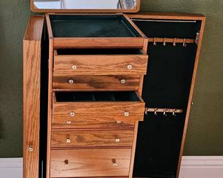 Jewelry armoire cabinet.