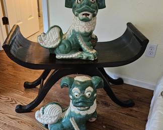 Scrolled ebonized Bench  and Pair Foo Dogs