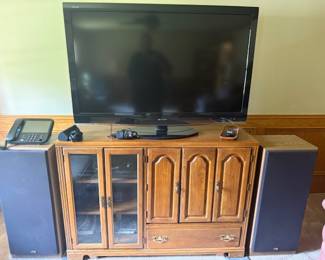 Wooden and glass entertainment center