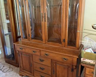 China cabinet with beautiful bowed glass.  Would make a great bar display!