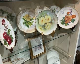 Signed and numbered floral plates