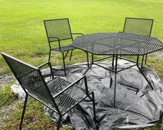 Freshly painted Wrought Iron patio set very heavy