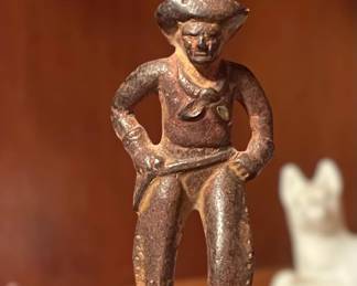 Antique Iron Cowboy Figurine