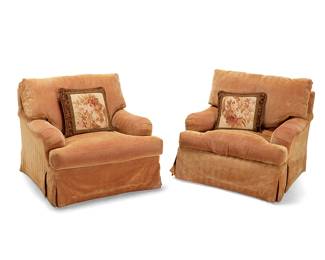 1081
A pair of Contemporary overstuffed armchairs
Late 20th century
The pale salmon upholstered armchairs, each with a custom Aubusson tapestry floral pillow
2 pieces
Each chair: 37" H x 36" W x 40" D
Estimate: $200 - $300