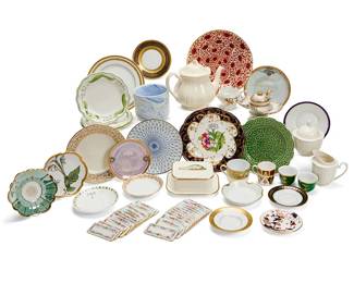 1153
An assorted group of ceramic tableware items
20th/early 21st century
Most variously marked for maker
From makers including Coalport, Bernardaud Limoges, Haviland, Tiffany & Co., Ceralene, Christian Dior, Queen's China, Anna Weatherley, Mikasa, Rosenthal, Thomas Bavaria, Abbeydale, DW Porzellan, and others, including plates, cups, saucers, tea service items, demitasse cups, and more
56 pieces
Teapot 6.25" H; Largest plate 9.25" Dia.
Estimate: $500 - $700