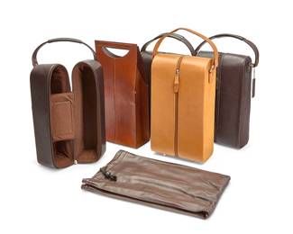 1100
A group of leather wine carriers
Late 20th/21st century
Most variously marked for maker
Comprising twelve leather carrier bags, including one single and five double hard-sided bags as well as six soft leather double pouches in various colors and by various makers including Le Donne and Ameri
12 pieces
Largest: 15" H x 7.25" W x 3.75" D
Estimate: $300 - $500
