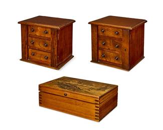 1097
A pair of English rosewood miniature Wellington chests
19th/20th century
Pine stamped to underside: Vintage Editions Inc / Taylorsville, NC
Comprising a pair of miniature Wellington chests with three-drawers, turned wood knob pulls, and a hinged panel lock, together with a pine hinged box with corner joinery and a printed image of a covey of quail in flight on the lid
3 pieces
Pair: 9.5" H x 10.5" W x 8" D; Pine: 5" H x 15" W x 9.5" D
Estimate: $300 - $500