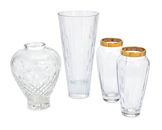 1240
A group of Contemporary glass vases
Late 20th/early 21st century
Each Lenox with stencil mark; each Rogaska with stencil mark
Comprising a pair of Lenox ribbed and paneled vases with gilt rims (10" H x 5" Dia.), a Rogaska tall fluted flared vase (13.5" H x 6.5" Dia.), and a Rogaska etched bulbous-form cut glass vase (10.5" H x 9" Dia.)
4 pieces
Estimate: $300 - $500