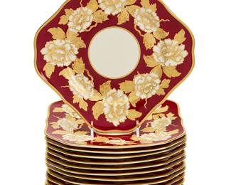 1152
A set of thirteen Rosenthal porcelain square dessert plates
20th century
Each marked to underside: Rosenthal / Ivory / Germany; gilt painted: 6169
Each with white and gilt flowers on wide maroon rims
13 pieces
Each: 8.25" W x 8.25" D
Estimate: $200 - $300
